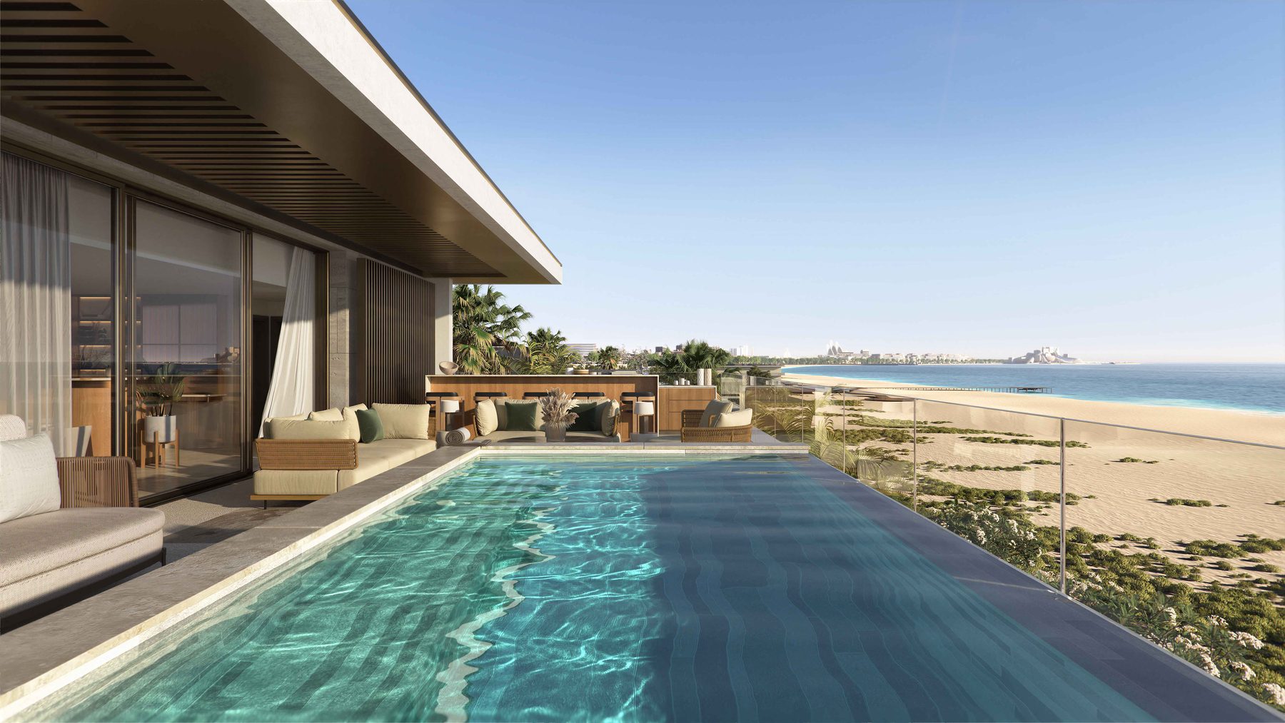 A private pool above the beach, with the Abu Dhabi skyline on the horizon