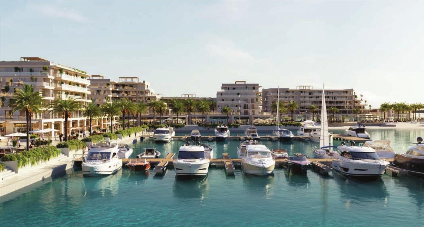 The marina at Ramhan Island, with berths, apartments and waterfront dining