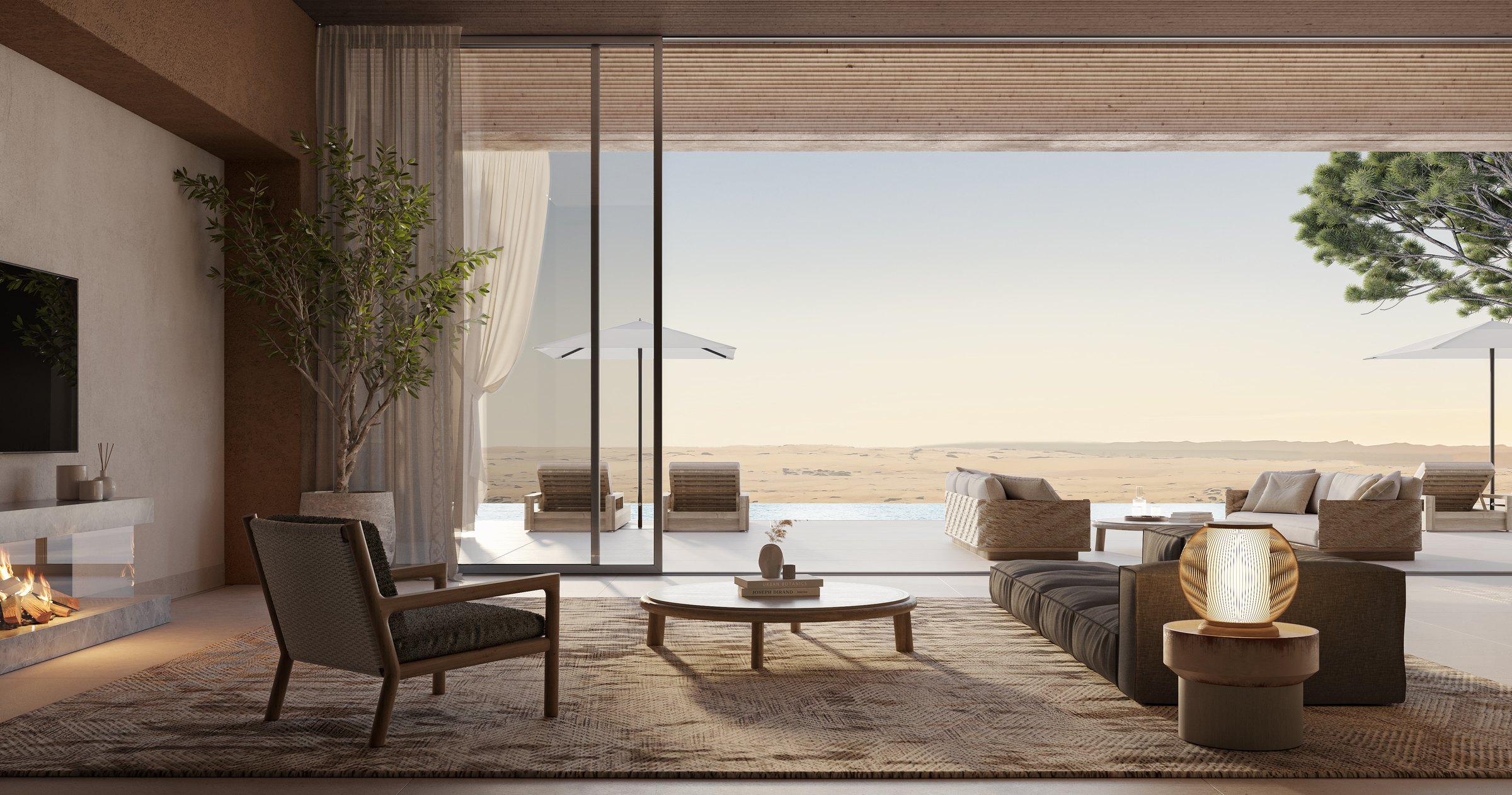 Villa living area opening onto the pool terrace and the desert beyond