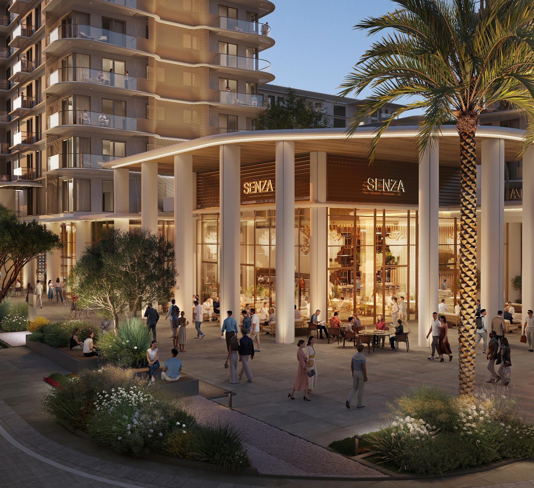 Street level retail and dining at The Strand in the evening